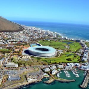 Panoramic view of Table Mountain, colorful houses in Bo-Kaap, Cape Point cliffs, and penguins at Boulders Beach – must-see attractions in Cape Town